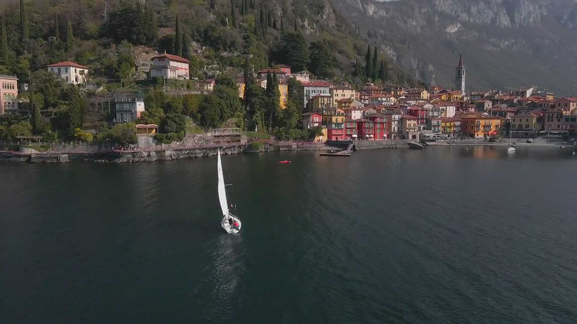 Video thumbnail for A Boat Sailing in Lake Como near Varenna Village