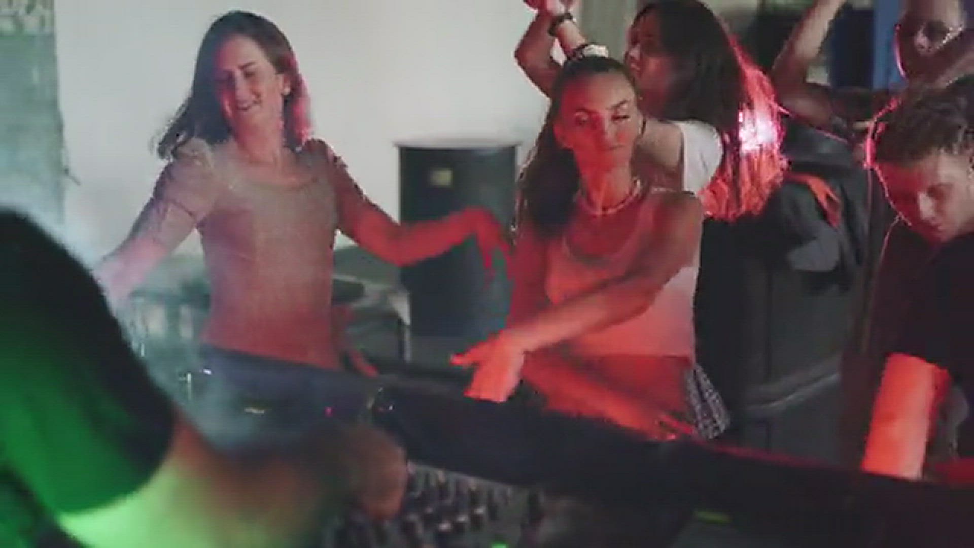 Video thumbnail for Woman Dancing in Front of a DJ