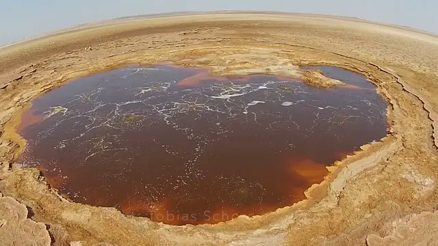 'Video thumbnail for The strangest lake in the world - mystery yellow fountains at Dallol's Yellow Lake - aerials'
