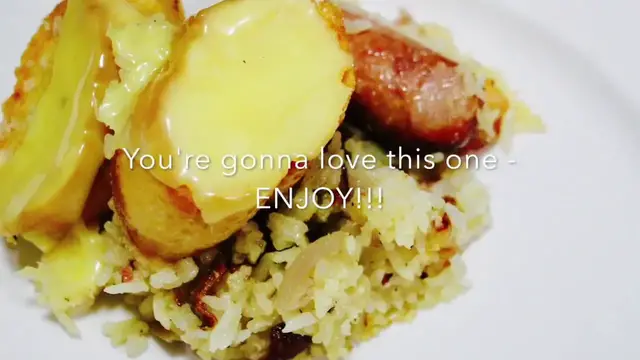 'Video thumbnail for Sausage, bacon & chicken rice bake with cheesy garlic bread'