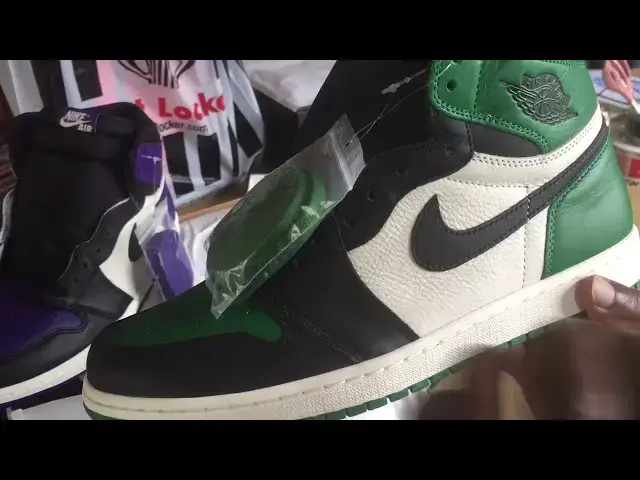 'Video thumbnail for Quick Look At The Air Jordan 1 pine green & court purple'
