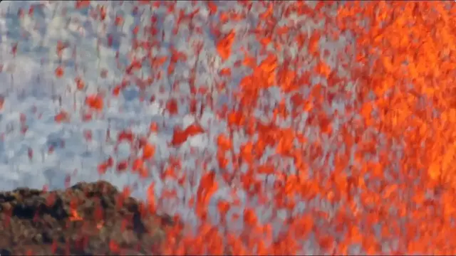 'Video thumbnail for Spectacular! Rain of fire - looking straight into a shower of liquid red hot lava'