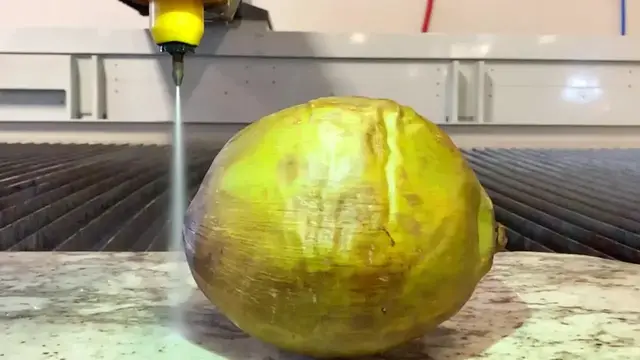 'Video thumbnail for Flow Mach 200 Water Jet Cutting Machine: Coconut Cutting Demo'