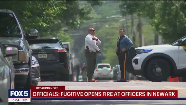 'Video thumbnail for NJ fugitive fires shots at officers in standoff involving baby'