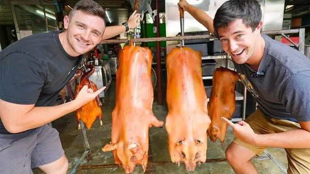 'Video thumbnail for Taiwanese Food - CRAZY BBQ Suckling Pig FEAST with @LoganBeck in Taichung, Taiwan!!'