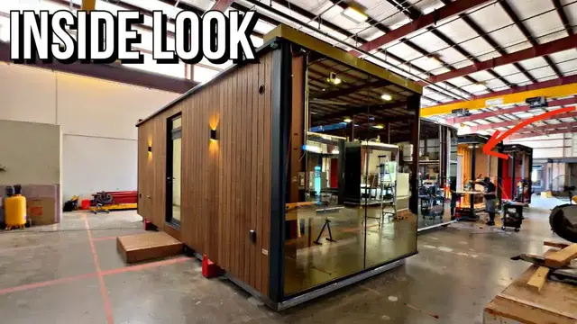 'Video thumbnail for kerry tarnow: inside a mirrored glass prefab home factory! ood house construction'