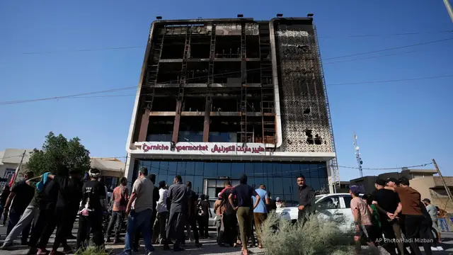 'Video thumbnail for At least 69 dead in Iraq mall blaze; 11 missing'