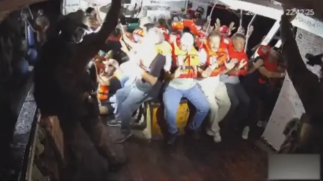 'Video thumbnail for Israeli forces storm Gaza-bound aid ship Handala in international waters'