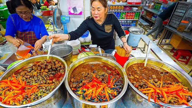'Video thumbnail for VIETNAM STREET FOOD Seafood Paradise  Bánh Xèo + CRAZY Snail Feast in Da Nang!'