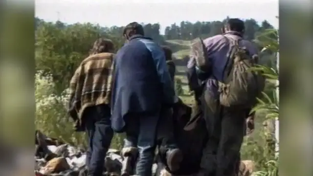'Video thumbnail for Bosnian Serb forces shell forest near Srebrenica as survivors trudge past dead bodies - July 1995'