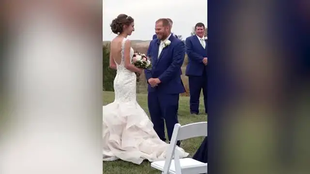 'Video thumbnail for Groom Goes Viral After Wrapping His Shivering Bride In Suit jacket During Outdoor Wedding | Happily TV'