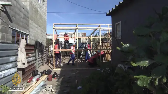 'Video thumbnail for South Africa social housing: Self-taught builders turning neglect to opportunity'