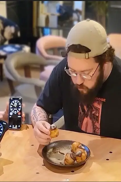 'Video thumbnail for Most profiteroles eaten in one minute'