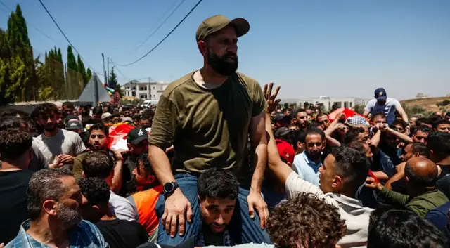 'Video thumbnail for Funeral held for Palestinian-American killed in West Bank settler violence'