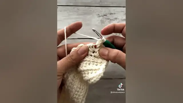 'Video thumbnail for Feather stitch tutorial. See how I made a cozy hoodie sweater with this stitch #crochetstitch'