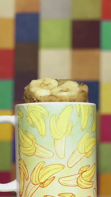 'Video thumbnail for Recipes, Videos, Food & Travel Shows ,Banana Bread Cake In A Mug'