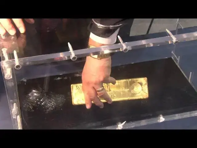 'Video thumbnail for CoinWeek Classic: APMEX Displays 400 Ounce Gold Bar at ANA World’s Fair of Money 2014'