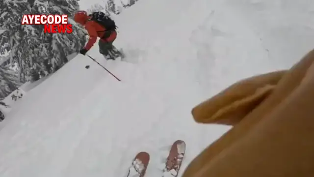 'Video thumbnail for Skier Saves The Life Of Snowboarder Stuck Upside Down In The Snow'