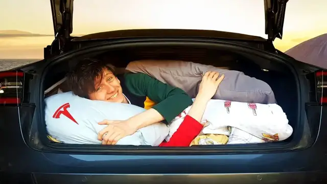 'Video thumbnail for Sleeping overnight in a Tesla Model 3'