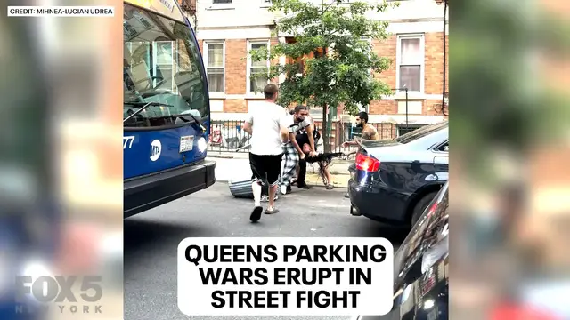'Video thumbnail for NYC parking spot fight over trash cans blocking space'