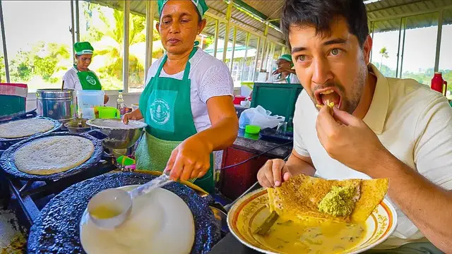 'Video thumbnail for SRI LANKAN STREET FOOD  Seafood "Ambulthiyal" + Fisherman Challenge in Sri Lanka!'