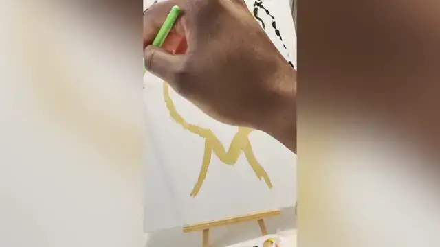 'Video thumbnail for Wife Paints "I'm Pregnant" On Portrait During Couple's Painting Session'