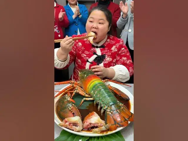 'Video thumbnail for Chinese Girl Eats Giant Rainbow Lobster! Crowd Cheers! 🦞🌈👏 #Shorts モッパン 中国'
