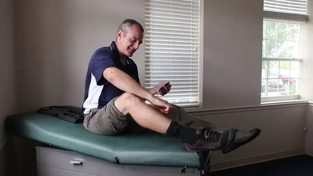 'Video thumbnail for Removing a TENS unit from a knee'
