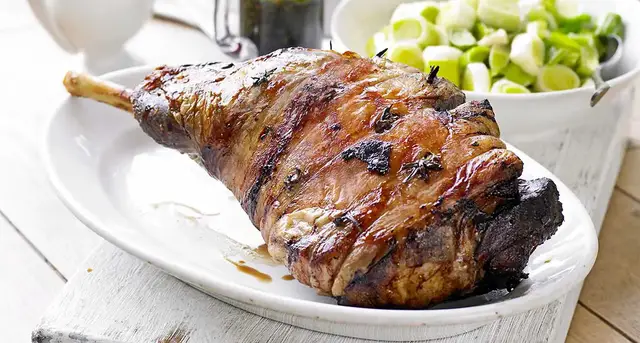 'Video thumbnail for Roast lamb studded with garlic & rosemary'