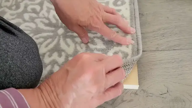 'Video thumbnail for The BRILLIANT new way people are using rugs in their bedrooms (not on the floor!)'