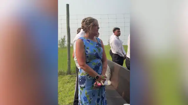 'Video thumbnail for Bride Stuns Mom By Walking Aisle in Her 90s Wedding Dress'