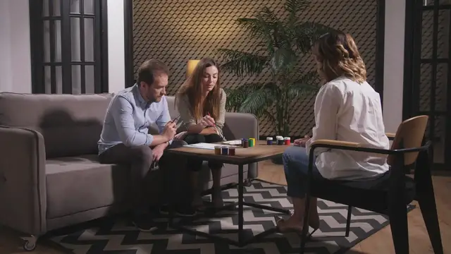 'Video thumbnail for couple-talking-to-counselor-looking-at-drawing-SBV-337629480-HD'