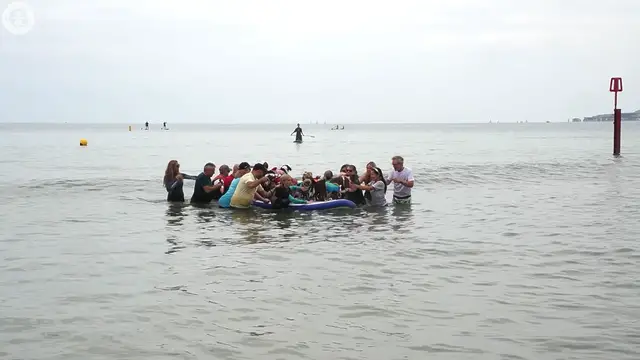 'Video thumbnail for Surf's pup! These dogs broke three paddleboarding records'