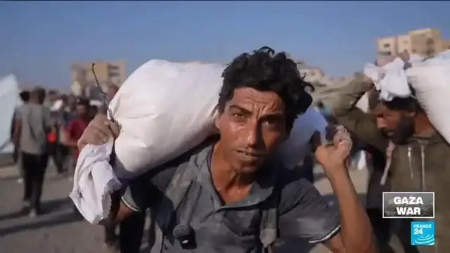 'Video thumbnail for Gaza: Aid begins trickling in as Palestinians starve'