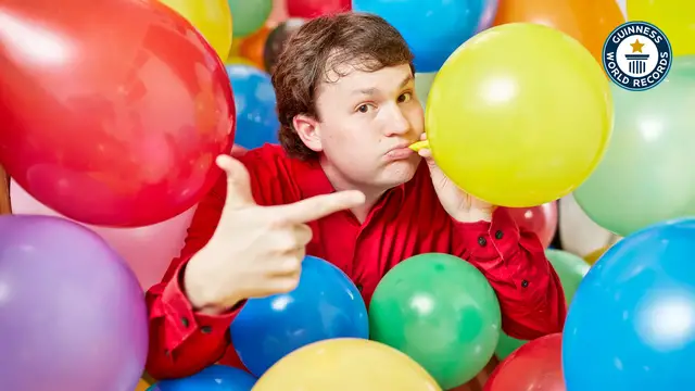 'Video thumbnail for Hunter Ewen sets world records conquering balloonphobia'