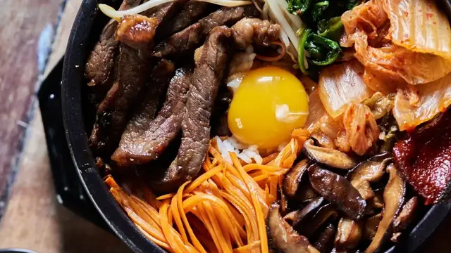 'Video thumbnail for Hot Stone Bibimbap Recipe'