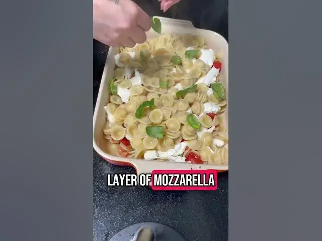 'Video thumbnail for Mozzarella, Tomato and Basil Pasta Bake'