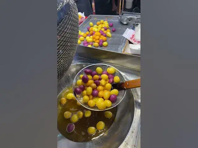 'Video thumbnail for Vietnam’s Famous Deep-Fried Sweet Potato Balls | Khoai Lang Bong Bóng #streetfood #foodshorts'